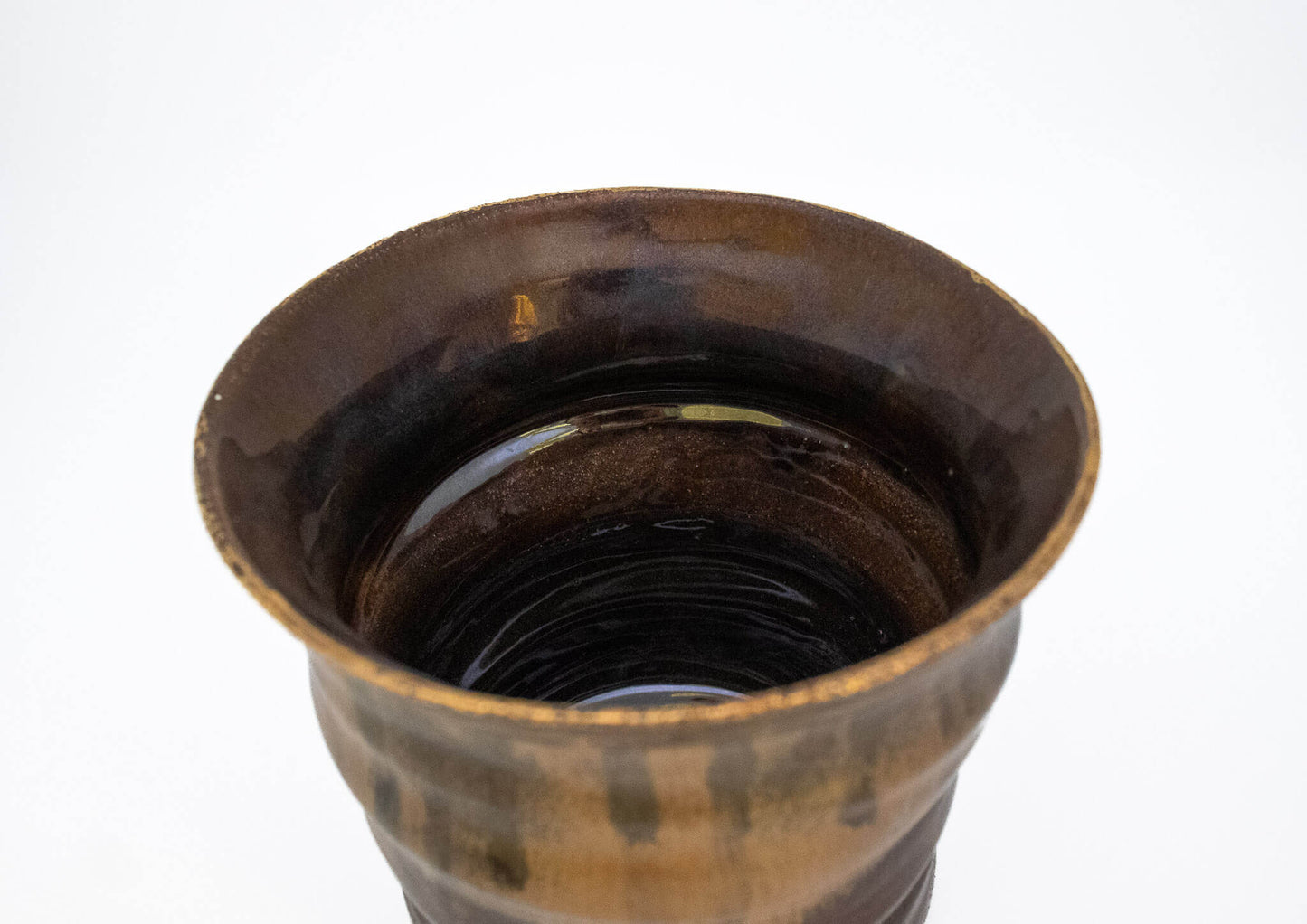Gold luster on Brown Glaze