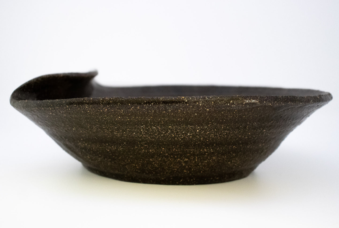 Gold luster on Black clay