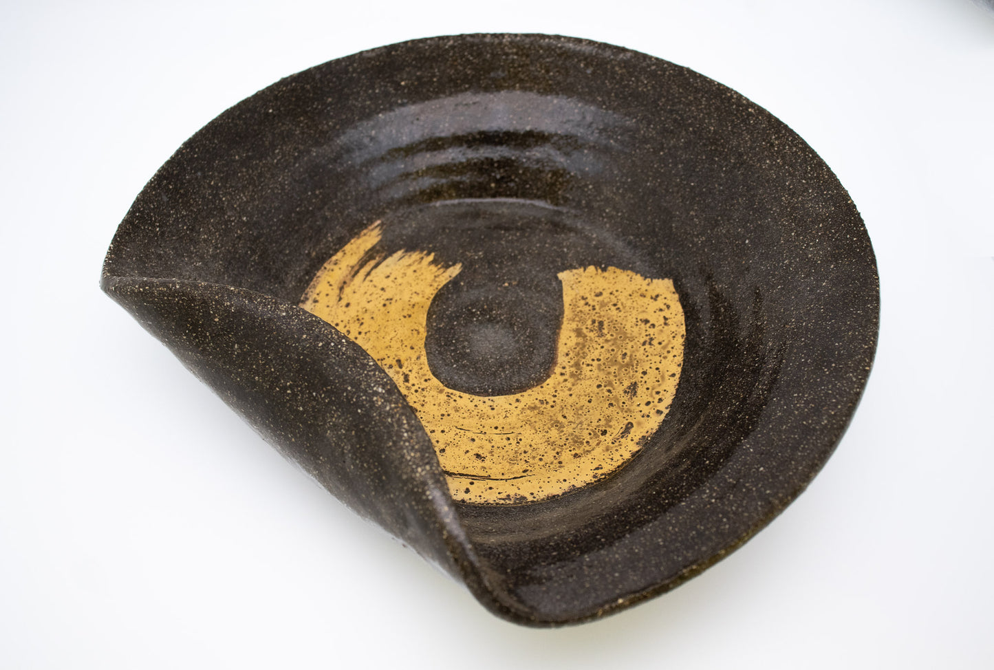 Gold luster on Black clay